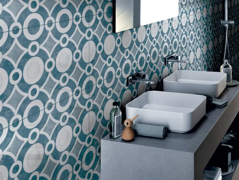 Elegant blue bathroom design featuring ceramic sparkle tiles, double sink and mirror